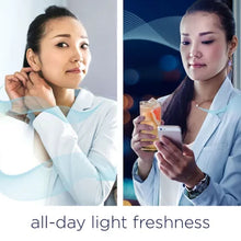 Woman enjoying all-day light freshness from Downy Ocean Mist scent booster beads liquid fabric softener