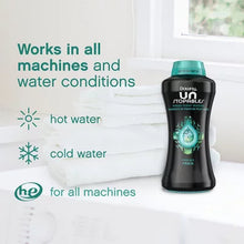 Downy Unstopables scent booster beads liquid fabric softener bottle by Brands For Less USA on white towels