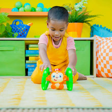 Bright Starts Roll & Glow Monkey Baby Toy with Lights and Melodies, Ages 6 Months +
