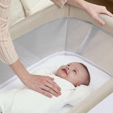 Delta Children Haven AirFlow Bassinet with Breathable Mesh and Wheels, Tan