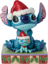 EnescoDisneyTraditionsCollectionbyJimShoreLiloandStitchSantawithScrumpFigurine-StoneResinHandPai_2252_1 - USA Mega Market