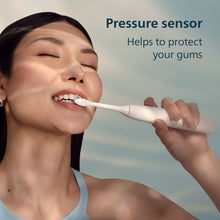 Philips Sonicare Total Clean Rechargeable Toothbrush, White Handles, 2 pk.