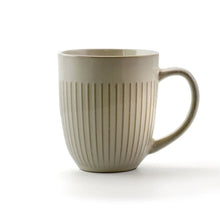 Elama Market Finds 16 Piece Round Stoneware Dinnerware Set in Embossed White